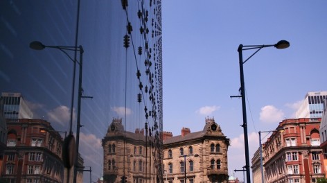 Manchester city centre, Exterior of National Football Museum on a sunny day, Susie Stubbs