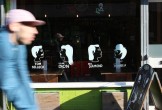 Man cycling outside Common, Manchester, Susie Stubbs for creativetourist