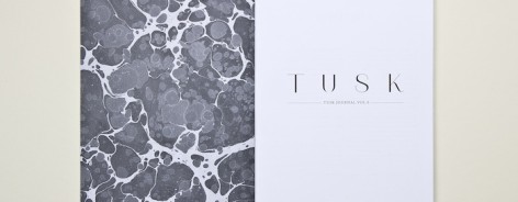 tusk volume 0 opening spread