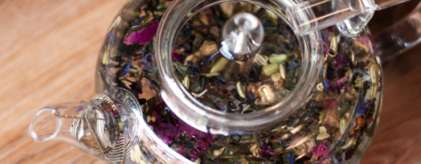 A glass teapot filled with specialist tea