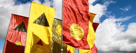 Red and yellow festival flags blowing in the wind