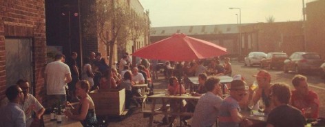 Photo of Camp and Furnace's outdoor seating in summer