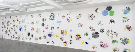 C++ by Ryan Gander, showing a wall of paint-splashed perspex palettes