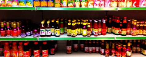 Photo of the Siam Smiles shelves, with colourful bottles of drink