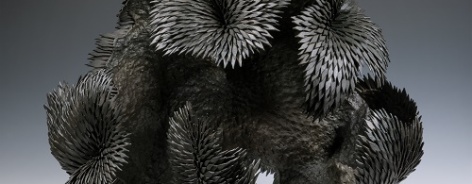 Photo of a stell forged wave sculpture