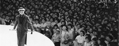 Photo of a woman modelling on a circular stage