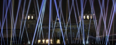 Photo of blue lasers coming from the ground