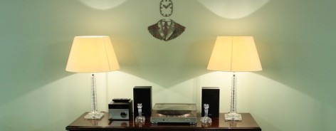 Photo of a bureau with two lampshades