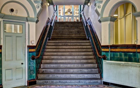 Photos of stairs to Levenshulme Antiques Village.