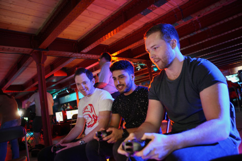 Men playing on video games