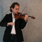 Manchester Camerata leader Giovanni Guzzo performs on a 1709 Stradivarius