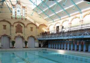 Photo of the inside of Victoria Baths, will a full pool and changing rooms