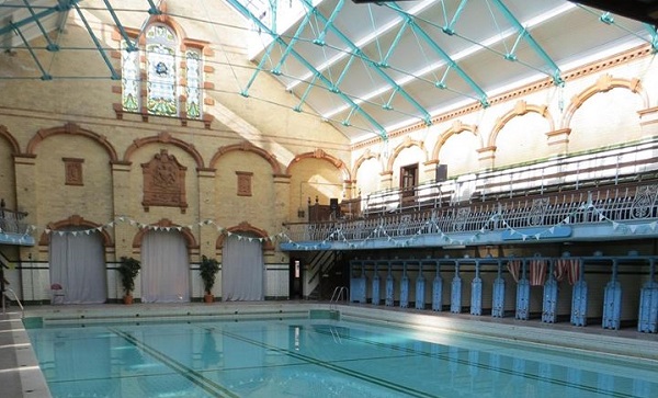 Photo of the inside of Victoria Baths, will a full pool and changing rooms