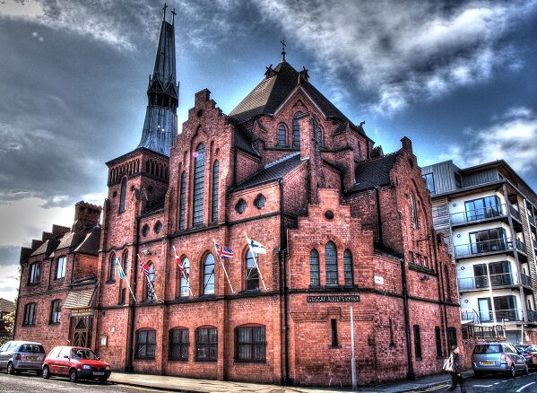 Photograph of the Scandinavian Seamen's Church with a bold blue sky