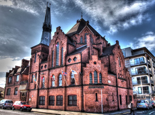 Photograph of the Scandinavian Seamen's Church with a bold blue sky