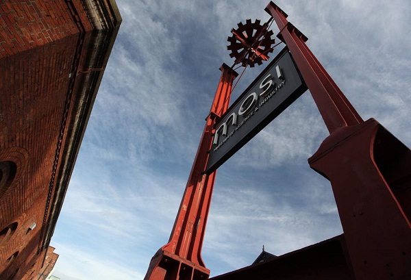 Photograph of the raised sign in front of MOSI against a blue sky.