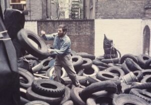 Photo of Allan Kaprow's YARD, a performance piece involving tyres.