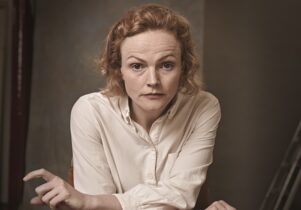 Photo of Maxine Peake in a white shirt as Hamlet