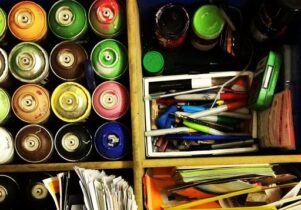 Photo of paint tubes and papers