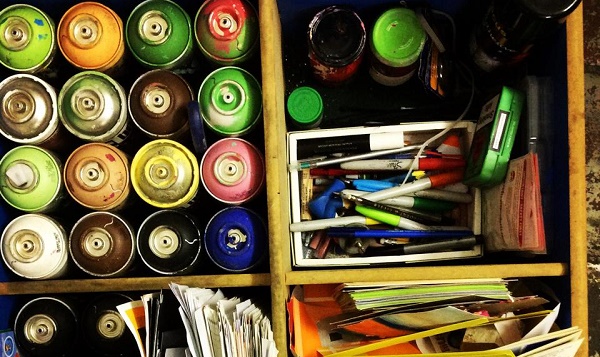 Photo of paint tubes and papers
