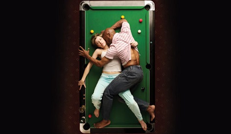 Photo from above of Othello and Desdemona on a pool table