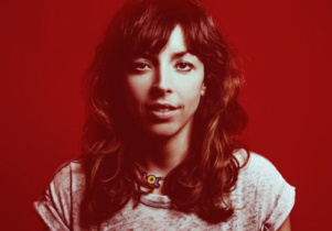 Red tinged photo of Briget Christie