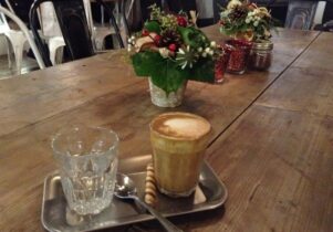 Photo of a coffee and a Christmas bunch