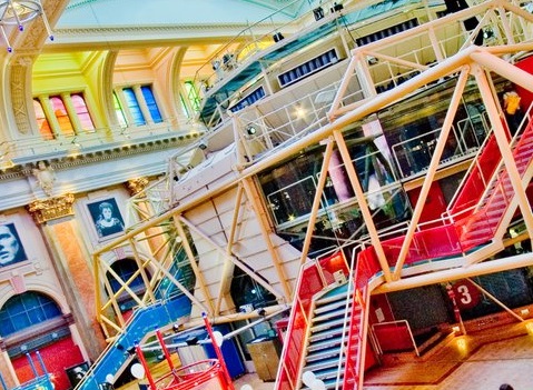 Photo of the theatre in the round and its colourful staircases