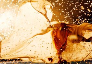 Photo of a man with billowing material around him