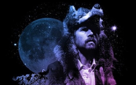 Photo of Gruff in wolf head with moon behind