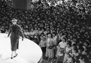 Photo of a woman modelling on a circular stage