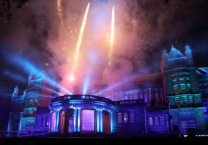 Photo of the Whitworth's front with fireworks coming from the roof