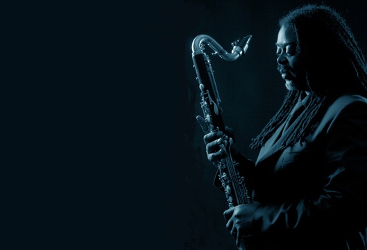 Black and blue photo of Courtney Pine