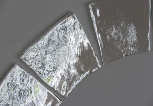 Liquid looking glass on a wall