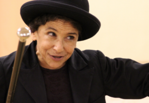 Photo of Kathryn Hunter in a black bowler hat