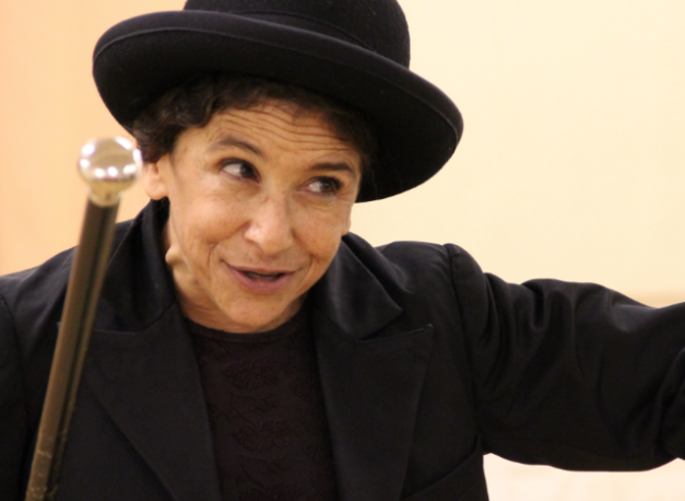 Photo of Kathryn Hunter in a black bowler hat