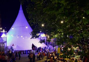Photo of the pavilion tent in Albert Sqaure at night