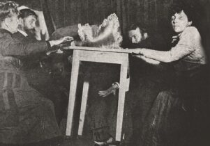 A table levitating during a seance.