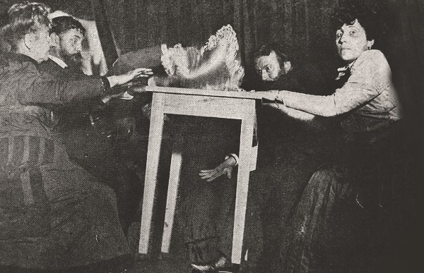 A table levitating during a seance.