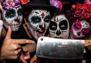 People wearing Day of the Dead facepaint