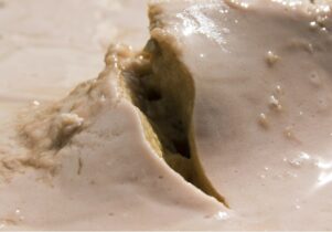 A tear in what looks like blancmange