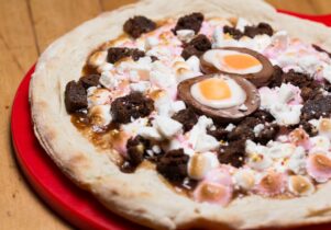Sweet Easter pizza with cream egg on top