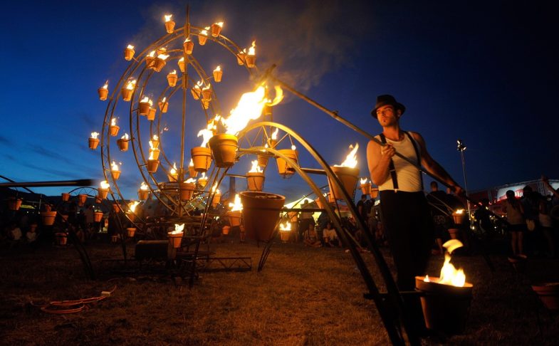 Man with fire plant pots