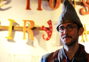 Oliver Wallace in a hat