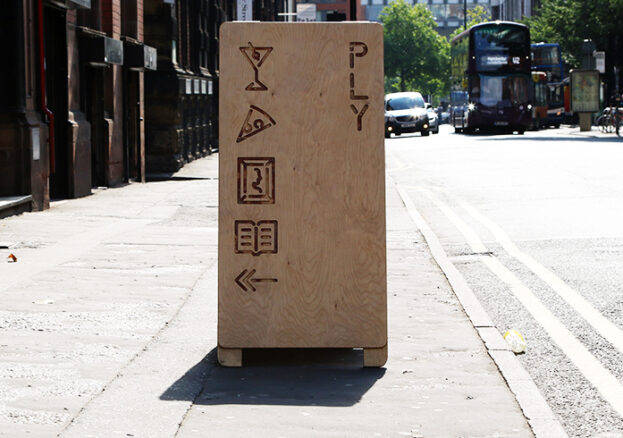 Image of signage outside PLY in Manchester's Northern Quarter