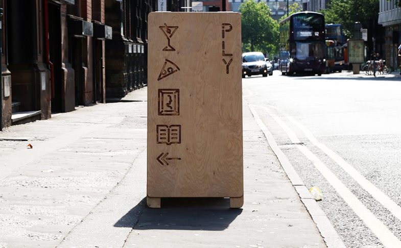 Image of signage outside PLY in Manchester's Northern Quarter