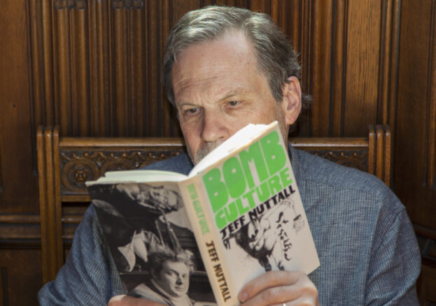 Curator Jay Jeff Jones reading a Jeff Nuttall first edition