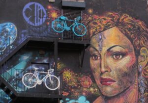 Graffiti on the side of a shop