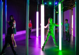 Digital Dimensions at Eureka! Children playing in digital dimensions with light pillars