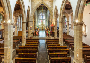 An interior shot of the arches within Lancaster Priory